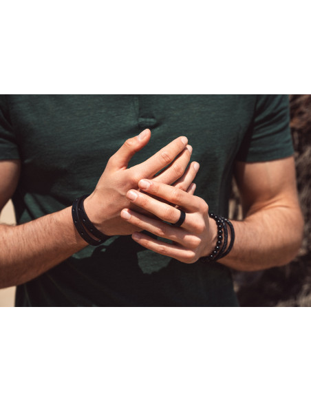 Bransoleta na czarnej gumce z naturalnych kamieni onyksu