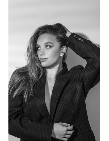 Srebrne kolczyki blaszki ze stali szlachetnej w kształcie kółek.